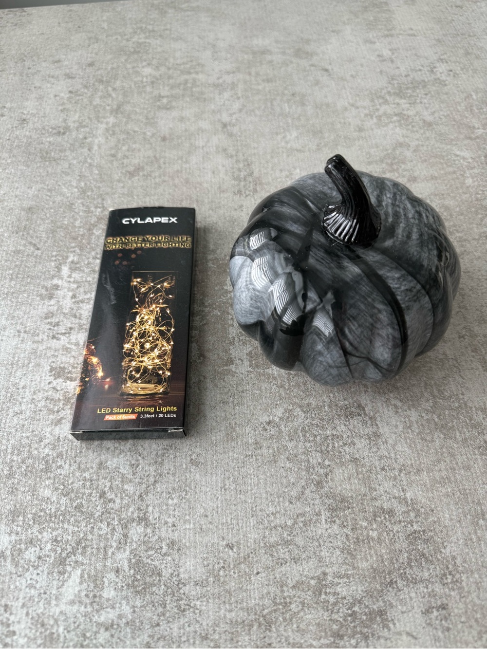 Black Marble Glass Pumpkin Accent with fair light to light up inside the pumpkin